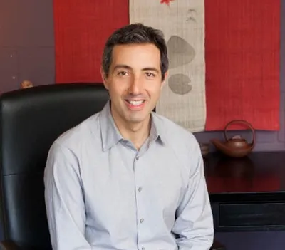 Robert Weinstein seated in his Eastlake treatment room